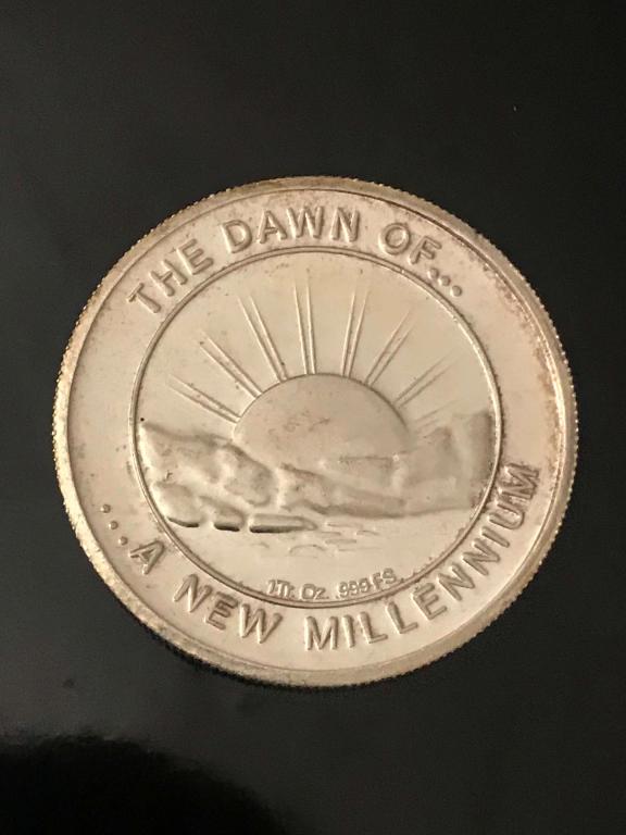NEW MILLENIUM 1OZ .999 ROUND BULLION (1 of 4)