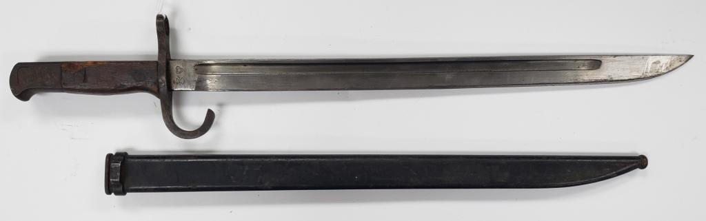 WWII Japanese Type 30 Arasaka Bayonet: With Scabbard. Some light rust on the handle.