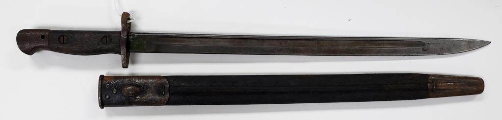 WWI British Enfield Model 1907 Bayonet W/Scabbard: Blade is nice. Some surface rust on the pommel & scabbard.