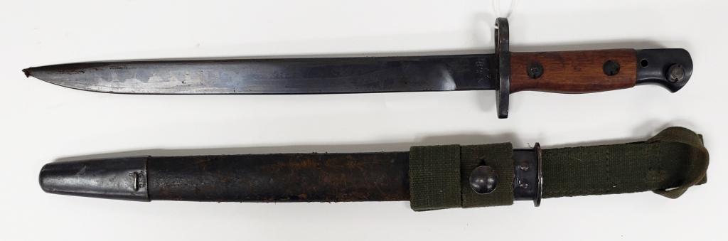 WWII British Model NWR 47 Bayonet W/Scabbard: Looks like a hand made canvas frog. Needs a light cleaning but in overall very good condition.