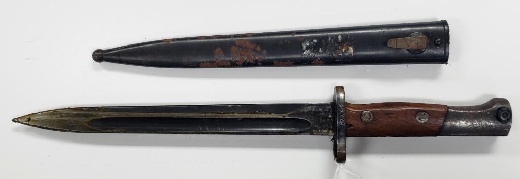 WWII Yugoslavian 44 Bayonet W/Scabbard: Blade is in very good condition and is protected by grease. Scabbard has some surface rust.