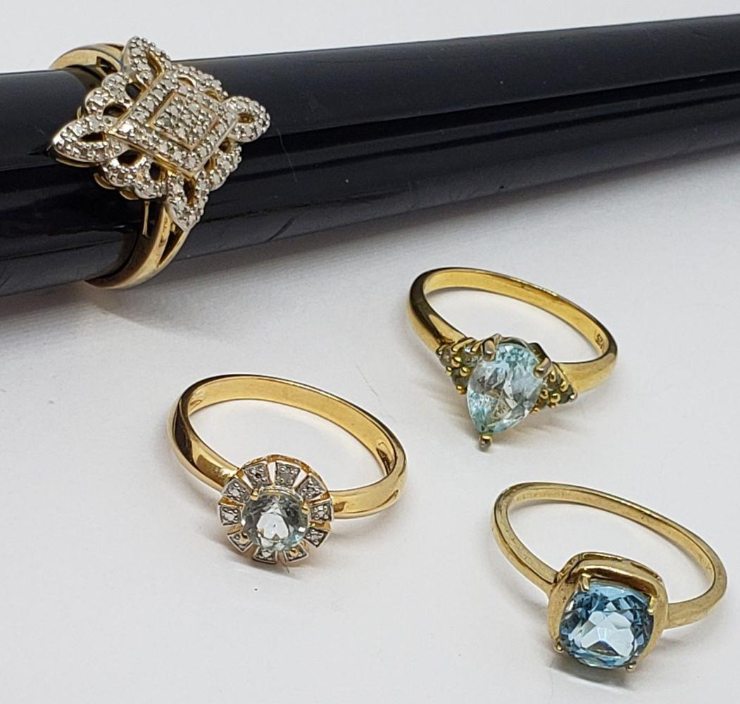 4-STERLING GOLD TONED RINGS WITH BABY BLUE (1 of 9)