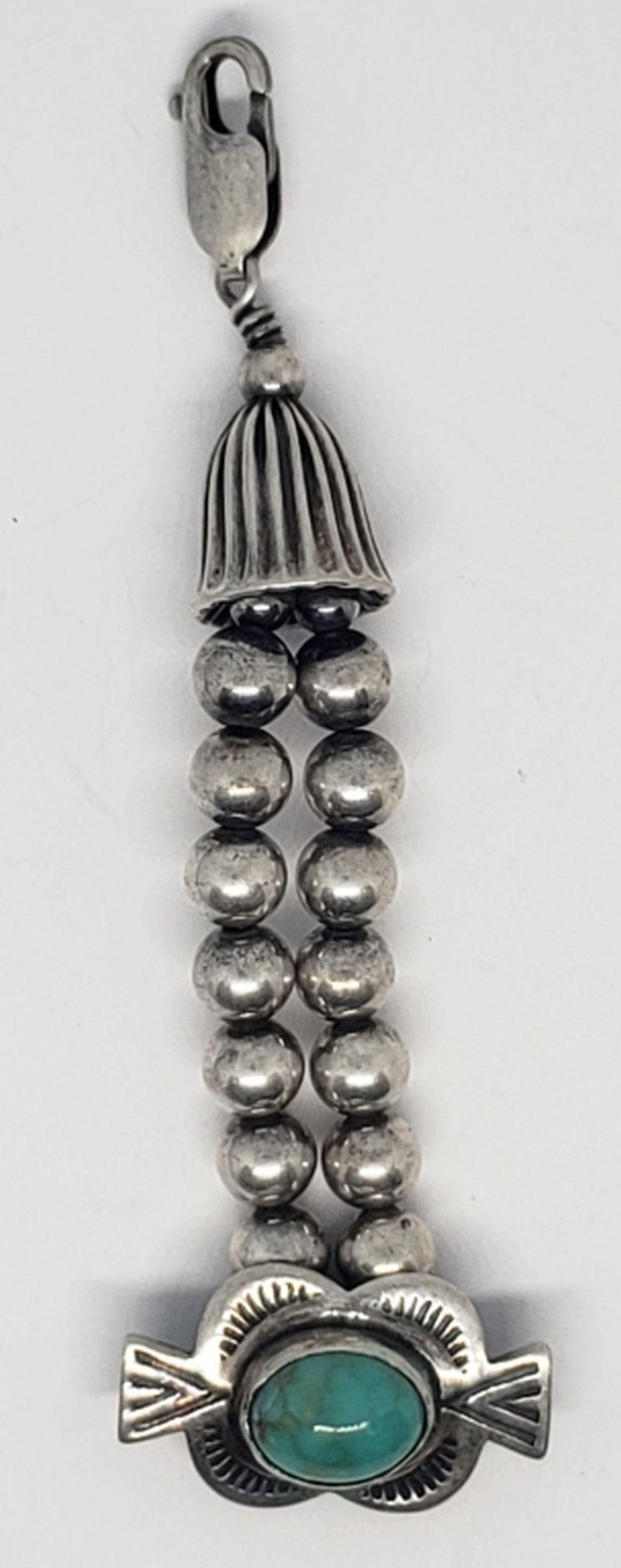 3 INCH NAVAJO STERLING BEADED KEYCHAIN WITH: CHARM WITH GREEN TURQUOISE CENTER STONE AND ETCHED BORDER. TOTAL 6.5 DWT