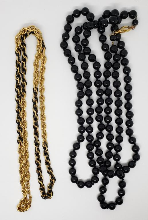 2-VTG LONG NECKLACES: (1)LR BLACK BEADED &: (1)MONEY GOLD TONED ROPE DESIGN WITH BLACK ENAMEL
