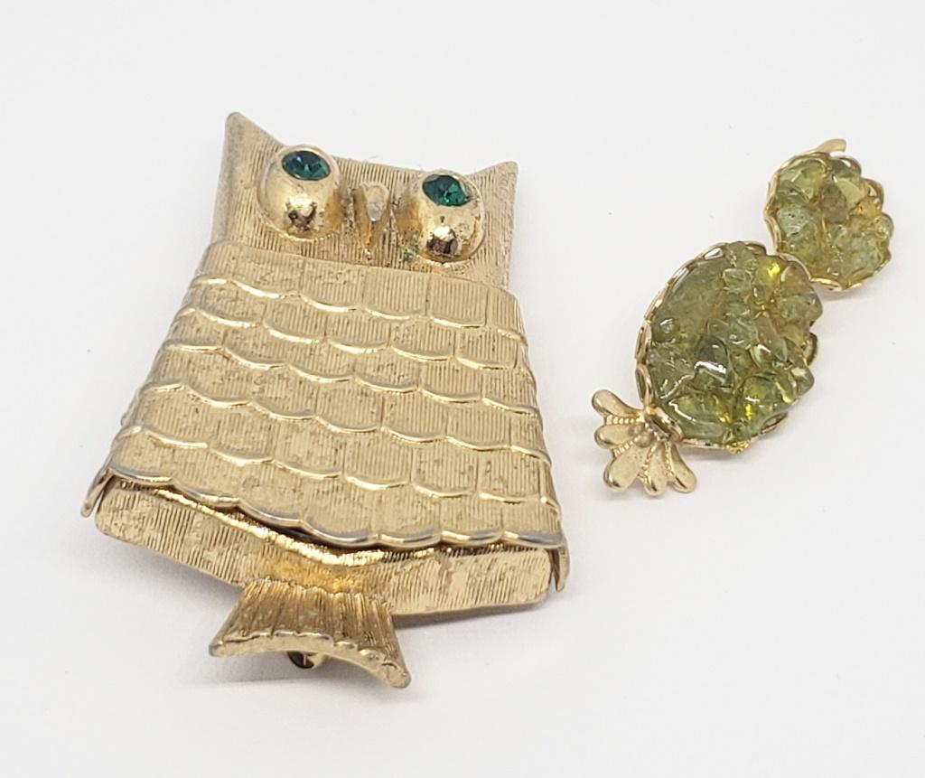 2-VINTAGE GOLD TONE OWL BROOCHES: (1)AVON: LIP BALM LOCKET & (1)WITH GREEN LUCITE