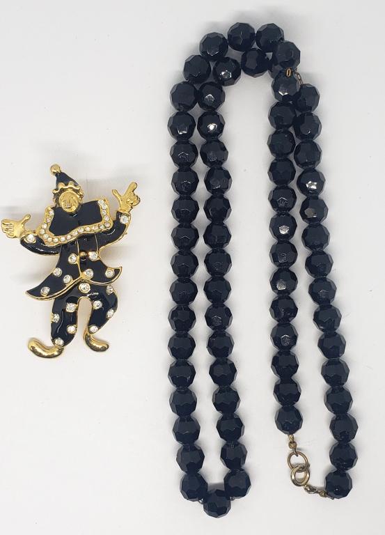 VINTAGE BLACK BEADED NECKLACE & GOLD TONED: CLOWN BROOCH WITH RHINESTONES AND BLACK ENAMEL