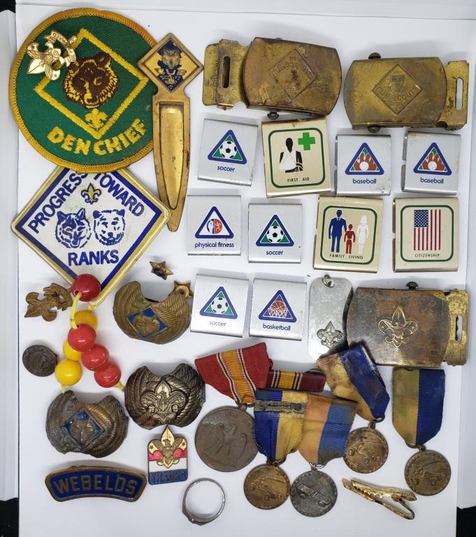 LARGE BOY SCOUT / CUB SCOUT VTG LOT: SEE PICTURES for FULL DETAILS - includes (2) CUB SCOUT TIE SLIDE (1) BOY SCOUT SLIDE ; (2) CUB BELT BUCKLES (1) BOY SCOUT BELT BUCKLE; STERLING CUB RING; WEBELOS PIN; (4) BOX CAR AWARDS; NATL DEFENSE 