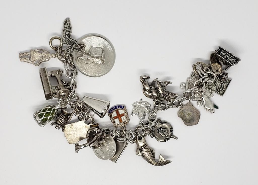 TRIFARI STERLING CHARM BRACELET w/21 CHARMS: 6 NOT MARKED - SEVERAL HAWAII THEMED ( 49.3 DWT)