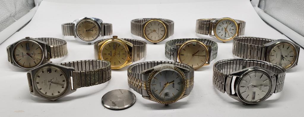 10-Mens Quartz Watches: Not Tested as to working or not some for parts or repair-some may work -Stretch Bands-Silver Bands-Round Faces with no numbers-Seiko,Caraville,3 Timex,Jalga,Pulsar,Zodiac
