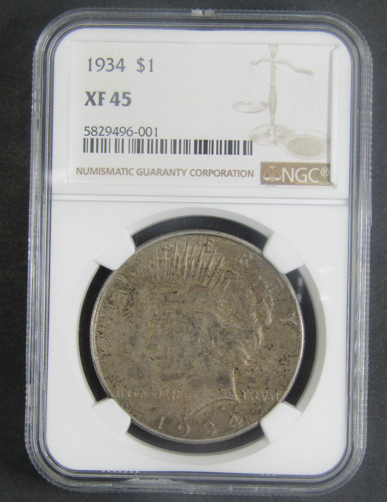 1934-P Peace Dollar $1 NGC XF45 (1 of 4)