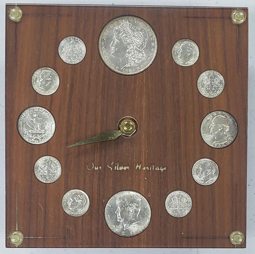 Silver Coin Clock Morgan, Half, Quarter, Dime: 1 Morgan, 1 Kennedy Half, 2 Washington Quarters, 8 Roosevelt Dimes. The Morgan is an 1883-O. The rest of the coins are from 1964. The clock needs fixed.