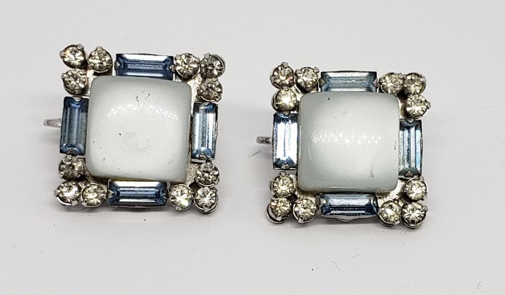 VINTAGE CORO SILVER TONED TWIST BACK EARRINGS: WITH BABY BLUE LUCITE CENTER AND CLEAR AND BABY BLUE RHINESTONE BORDER