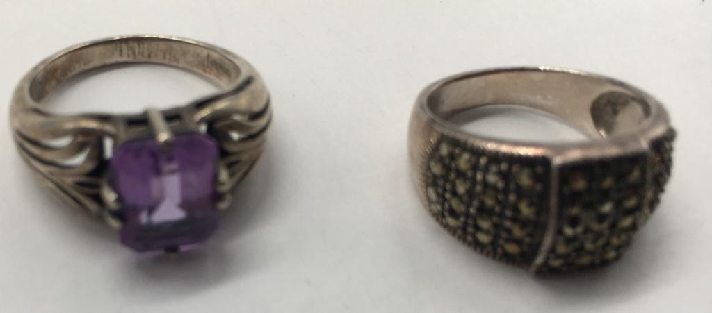 2 Sterling Rings: 2 Sterling 925 Rings Size 7-8 1 purple stone and one Marcasite 6.8 DWT