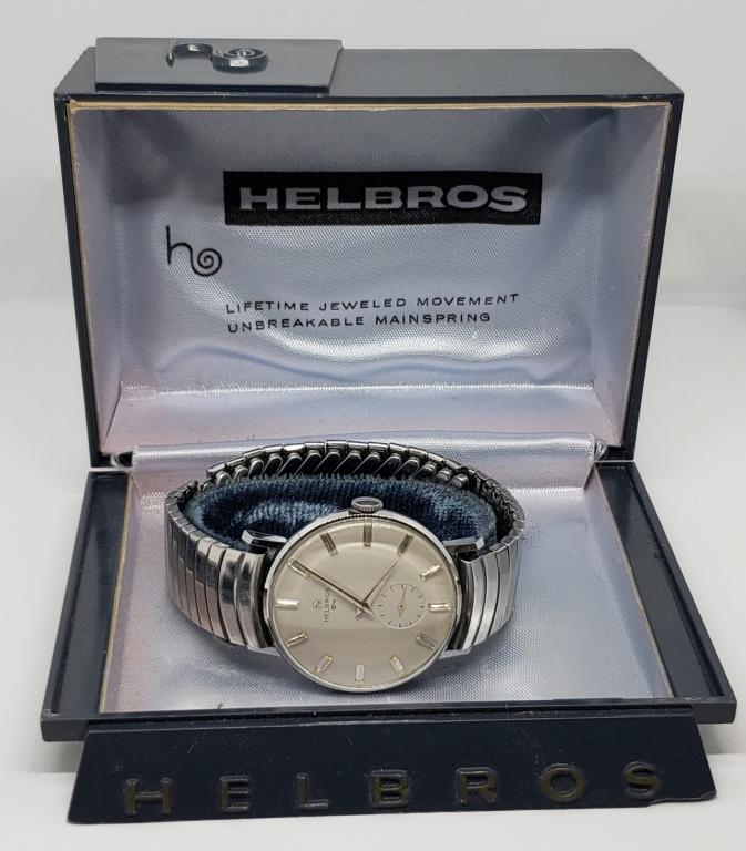 Vintage Helbros Mechanical Watch - Runs: 7 Jewels. Swiss Movement. With original box. In very good condition! Needs a light cleaning and may need a servicing. Band is missing a cap. Can be easily repaired.
