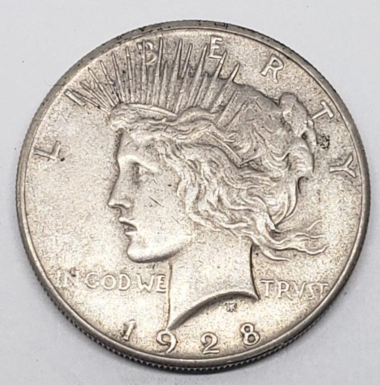 1928 PEACE SILVER DOLLAR (1 of 2)