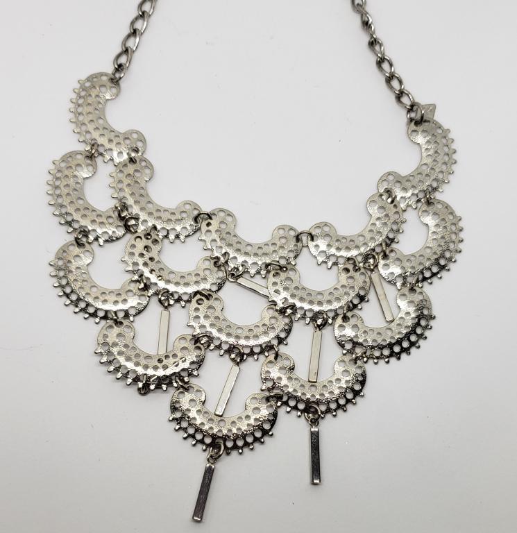 VINTAGE SILVER TONED BIB NECKLACE: CUT OUT WITH DANGLY CHARMS
