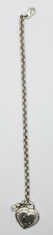 7 INCH DE STERLING ID BRACELET WITH HEART CHARM: WITH INITIALS "MZJ". TOTAL 12.3 DWT