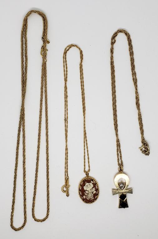 VINTAGE TRIFARI FLOWER CAMEO PENDANT WITH: CHAIN PLUS (1)CROSS PENDANT WITH BLACK LUCITE AND RHINESTONE WITH CHAIN-COMES WITH (1)BONUS MONET CHAIN-ALL CHAIN ARE DIFFERENT LENGTHS