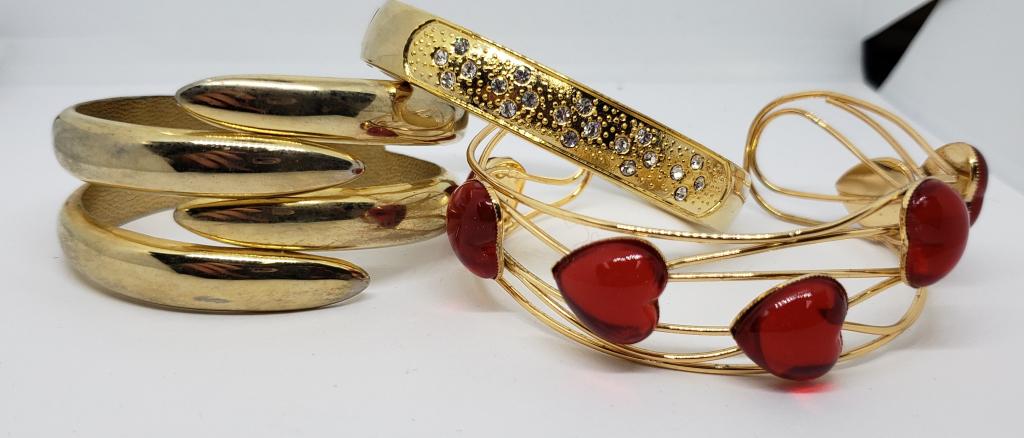 3-CHUNKY GOLD TONED BRACELETS: (1)HINGED WITH (1 of 2)