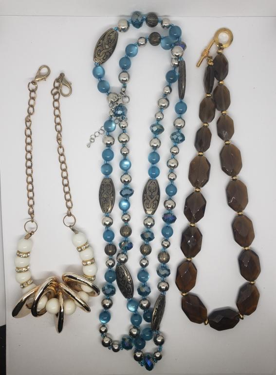 RALPH LAUREN GOLD TONED BROWN BEADED: NECKLACE (1)GOLD TONED WHITE BEADED NECKLACE WITH RHINESTONES & (1)BLUE AND SILVER TONED BEADED NECKLACE-DIFFERENT LENGTHS