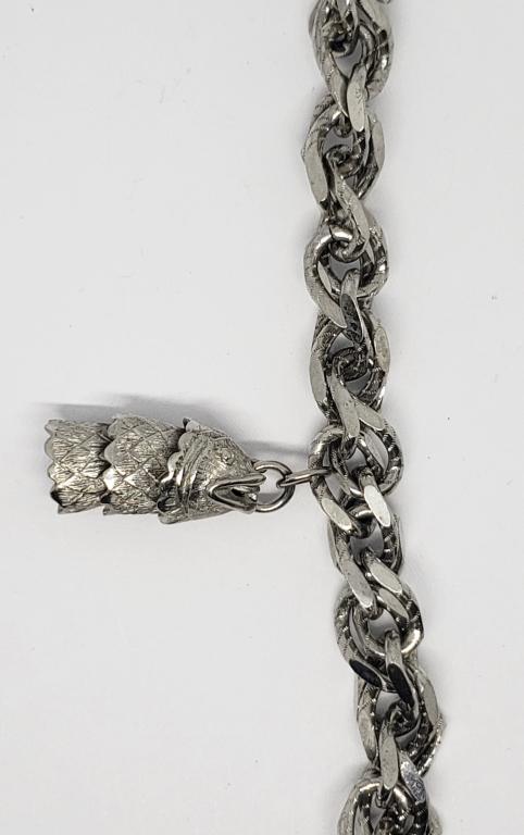 VINTAGE SILVER TONED LINKED CHARM BRACELET (1 of 3)