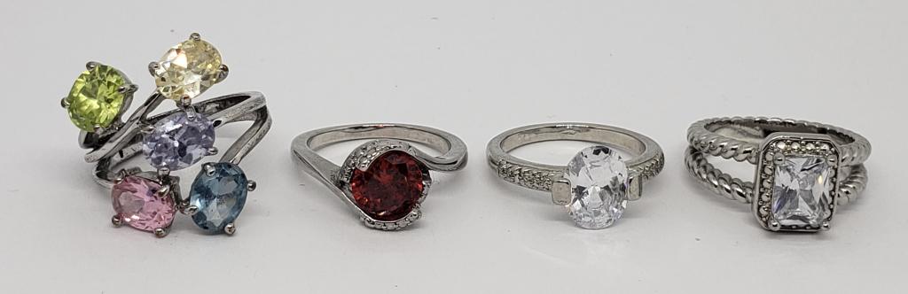 4-SILVER TONED FASHION BLING RINGS: MULTI COLORED STONES-VARIOUS SIZES