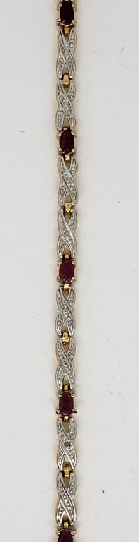8 INCH GOLD TONED STERLING TENNIS BRACELET: WITH MAROON AND CLEAR STONES-TOTAL 6.7 DWT