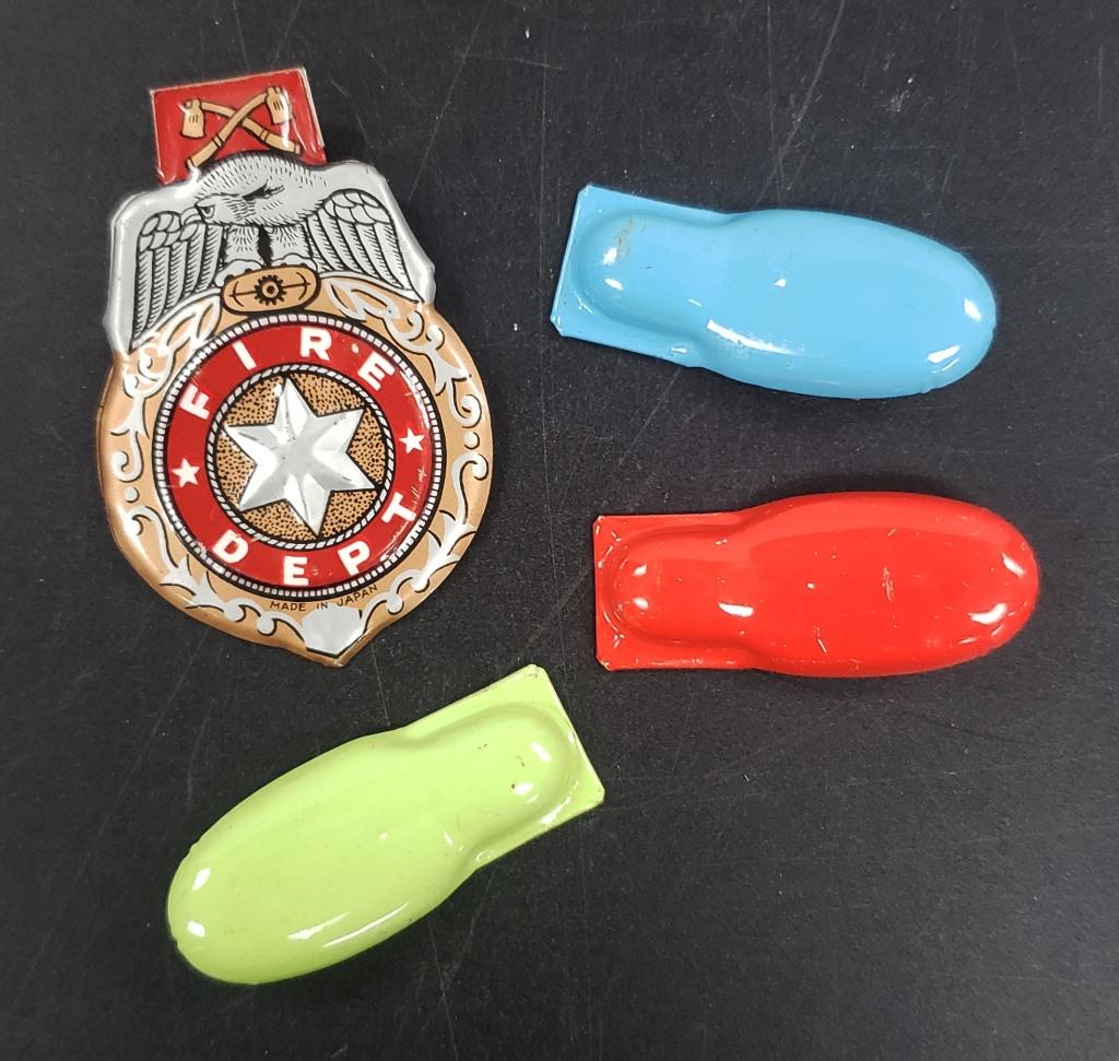 Tin Litho FIRE DEPT. Fireman's badge: plus (3) METAL TIN TOY CLICKERS
