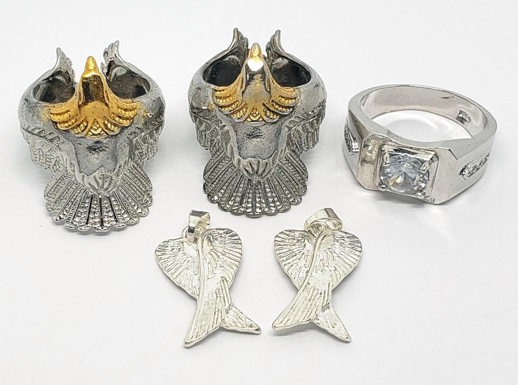 SILVER TONED RINGS AND PENDANTS (1 of 2)