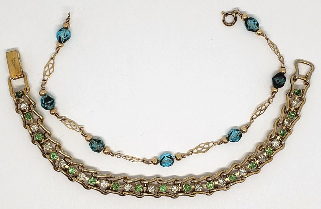 2 GOLD TONED FASHION BRACELETS: GREEN AND WHITE RHINESTONES, BLUE BEADED