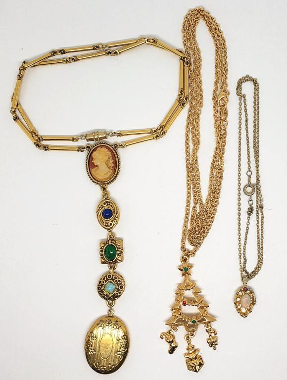 3 VINTAGE GOLD-TONED NECKLACES; 1 LOCKET;: CHRISTMAS TREE; DELICATE LEAF TYPE PENDANT