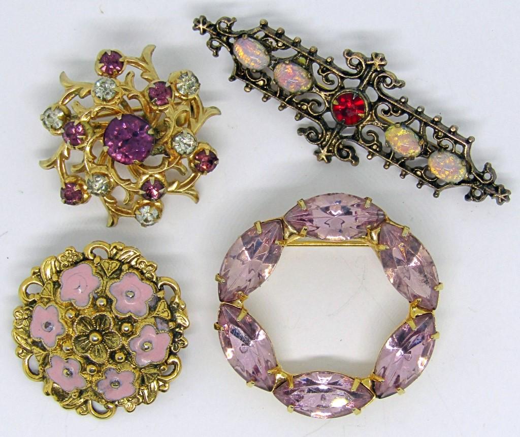 4-VINTAGE GOLD TONED BROOCHES WITH PURPLE: RHINESTONES/LUCITE/ENAMEL-CORO-FREIRICH-SARAH COVENTRY