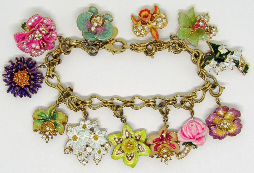 NOLAN MILLER GOLD TONED FLOWER CHARM: BRACELET-ENAMEL-RHINESTONES