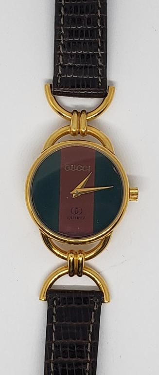 GUCCI WATCH TIMEPIECES LADY: NOS,6000l series.Goldplated -Saphire Crystal - RUNNING - PRE OWNED - VERY NICE CONDITION - FRESH BATTERY