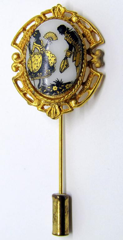 VINTAGE GOLD-TONED PIN;: LADY AND GENTLEMAN DESIGN ON FACE OF PIN!