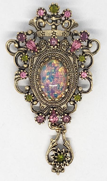 VINATAGE SARAH COVENTRY GOLD TONED BROOCH: WITH PINK GREEN AND PURPLE RHINESTONES-LARGE PINK AND BLUE CHIP LUCITE CENTER