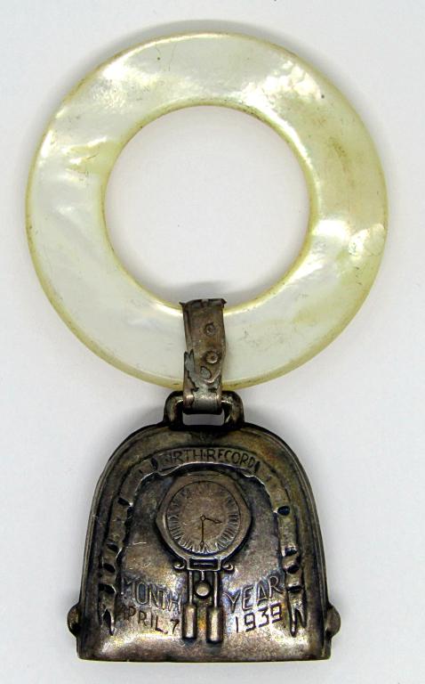 VINTAGE STERLING BABY RATTLE WITH MOTHER: OF PEARL CIRCULAR HANDLE-TOTAL 11.2 DWT