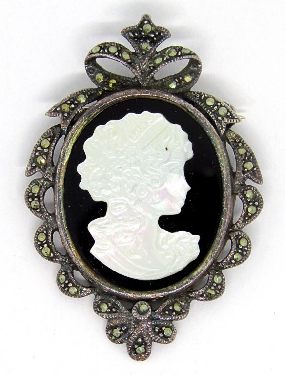 VINTAGE STERLING CAMEO BROOCH WITH MARCASITE: BORDER-CARVED MOTHER OF PEARL ACCENT-TOTAL 7.7 DWT