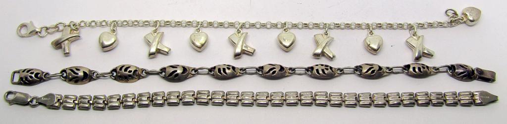 3-STERLING BRACELETS: (1)WITH "X" AND HEART: CHARMS (1)MADE IN ITALY (1)MEXICO STERLING CLAW CUT OUT DESIGN-TOTAL 13.6 DWT