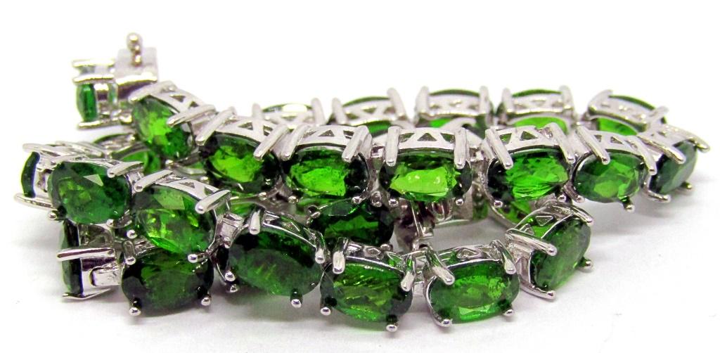 8 INCH STERLING TENNIS BRACELET WITH GREEN: STONES-TOTAL 8.4 DWT