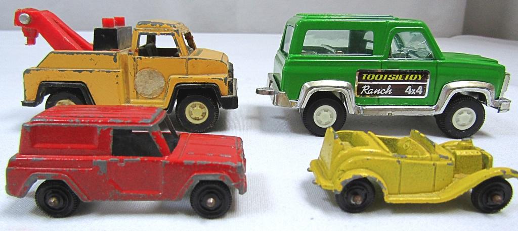 TOOTSIETOY LOT! 4 TOOTSIETOY MARKED CARS!: TOW TRUCK, CHEVY BLAZER 1970'S 4 X 4 RANCH TRUCK, TINY YELLOW ROADSTER DIECAST CAR, DIECAST PANEL TRUCK CHICAGO USA!