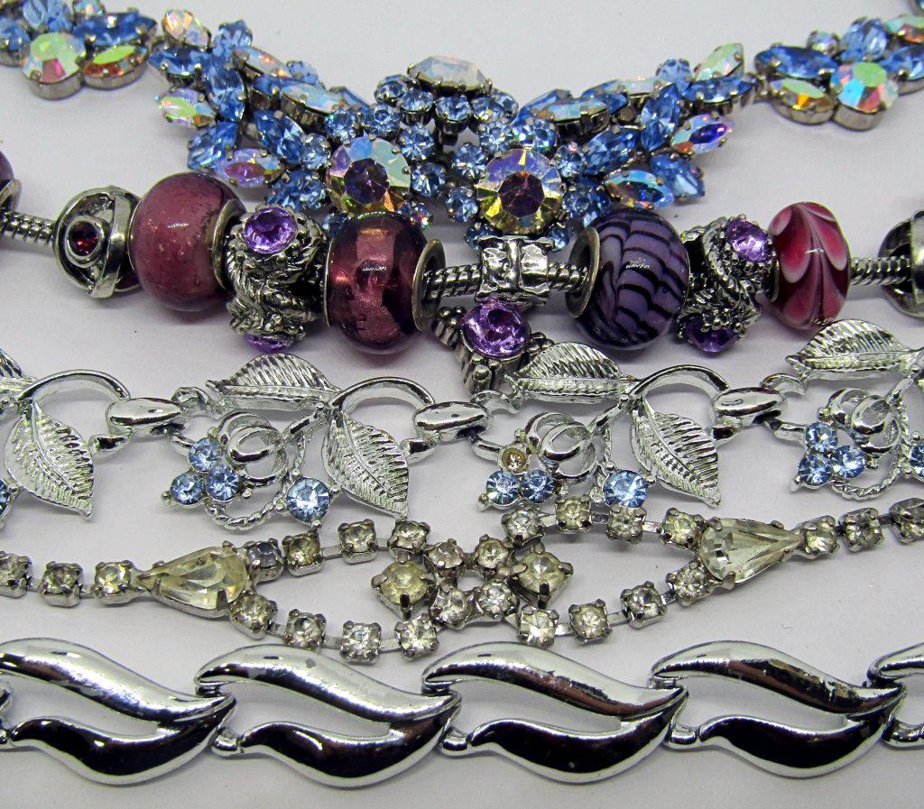 VINTAGE JEWELRY LOT; 3 NECKLACES, 3 BRACELETS,: 1 RING MARKED JANICE! 1 NECKLACE MARKED AUSTRIA, 1 BRACELET MARKED CORO!