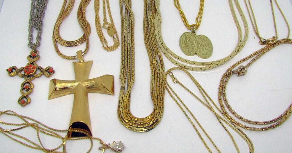 10 GOLD TONED VINTAGE NECKLACES: ONE MARKED TRIFARI, ONE MARKED AVON
