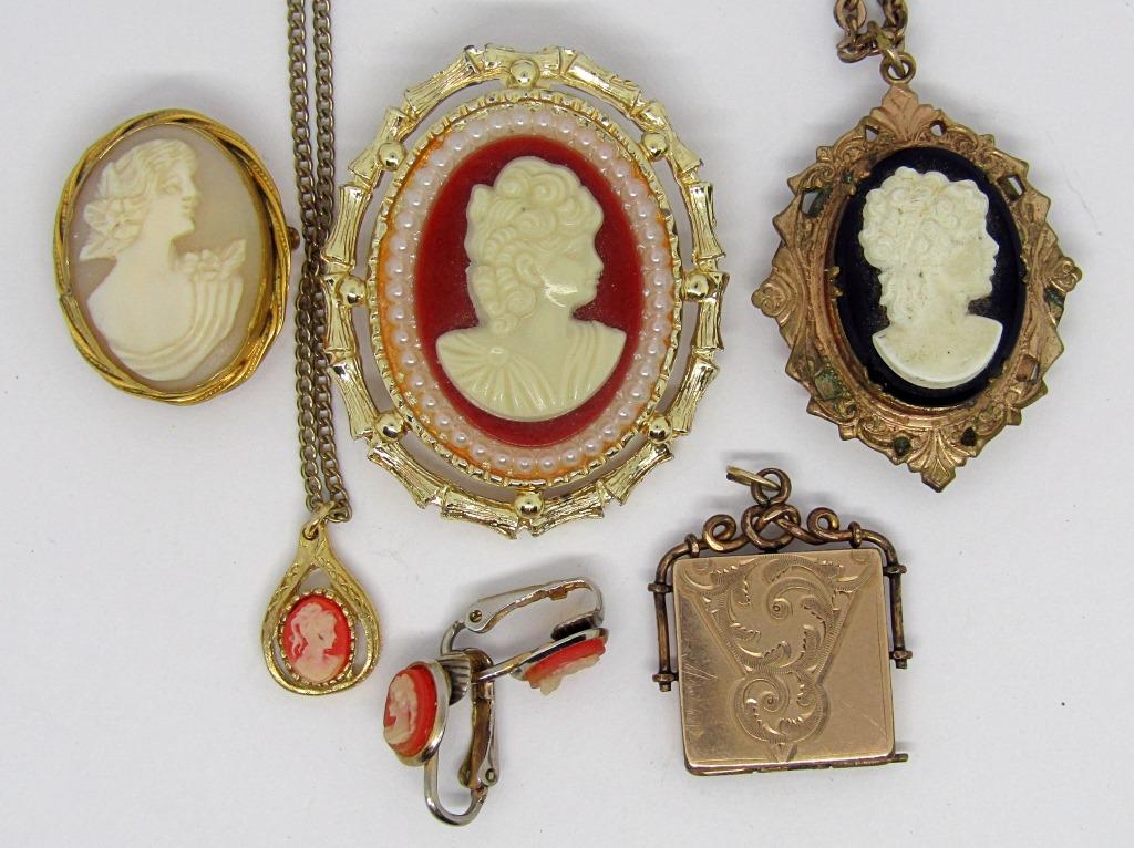 VINTAGE CAMEO JEWELRY LOT!: TWO NECKLACES - ONE IS A LOCKET, TWO PENDENTS - ONE IS A LOCKET, ONE BROOCH, AND CLIP ON EARRINGS
