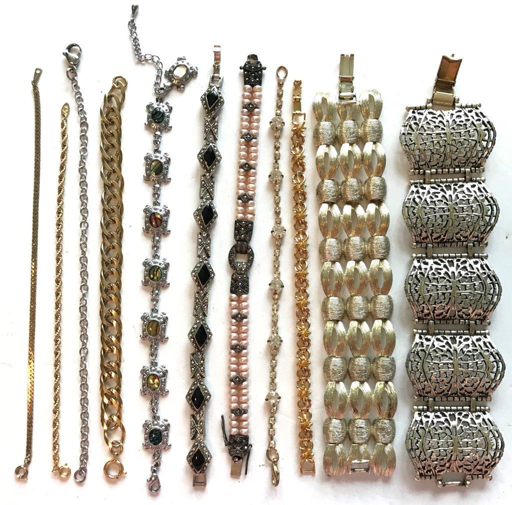 11 BRACELETS: PANEL, EMMONS, RHINESTONES, ABALONE, TURTLE, ONXY, TRIFARI,