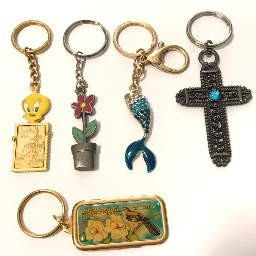 5 KEYCHAINS: TWEETY BIRD, FLOWER, MERMAID TAIL, CROSS, MISSISSIPPI