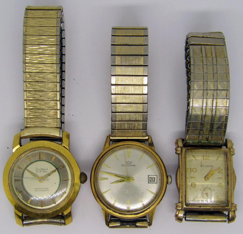 3-VINTAGE GOLD TONED MEN'S WRISTWATCHES: (1)GRUTTERT 21 RUBIS (1)GLYCINE DAY DATE (1)BULOVA #5989619-ALL WATCHES UNTESTED-PARTS/REPAIR