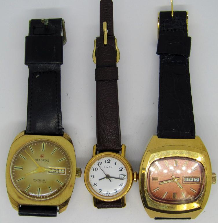 3-LEATHER BAND MEN'S/WOMAN'S WRISTWATCHES: (1)HELBROSE 17 JEWELS INVINCIBLE DAY DATE (1)TAKEMA DAY DATE (1)TIMEX DAY DATE-ALL WATCHES UNTESTED-PARTS/REPAIR