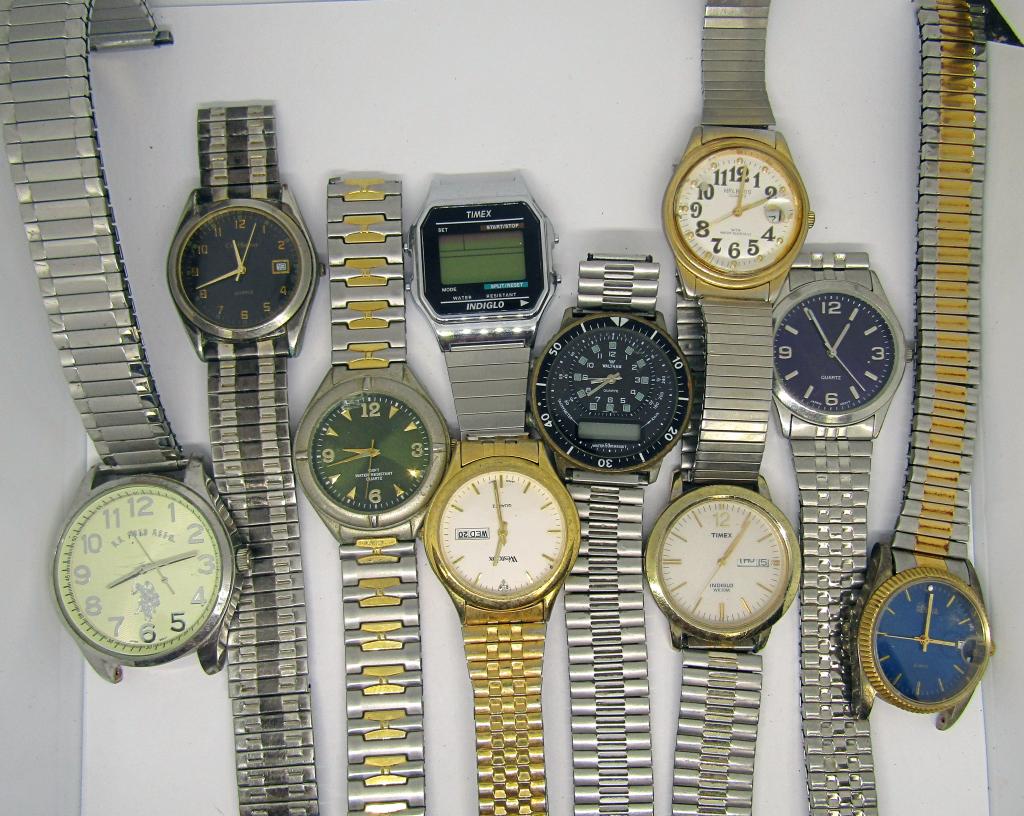 10-MEN'S WRISTWATCHES-ALL WITH BROKEN BANDS: (1)GENEVA QUARTZ DAY DATE (1)WALTHAM (1)CC HOME QUARTZ DAY DATE (1)POLO (1)QUARTZ (1)100FT WR (1)TIMEX INDIGLO WR 30M DAY DATE (1)WESTCLOX DAY DATE (1)HELBROSE 3ATM WR DAY DAY (1)TIMEX DIGITAL-ALL WAT