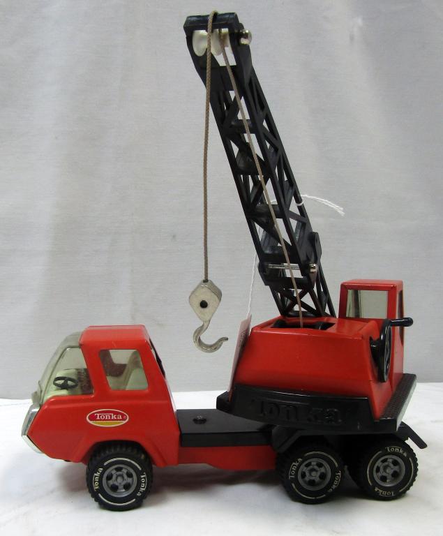 TONKA SWIVEL VTG CRANE TOY: 10 inches long, Orange swivel mini crane, working condition